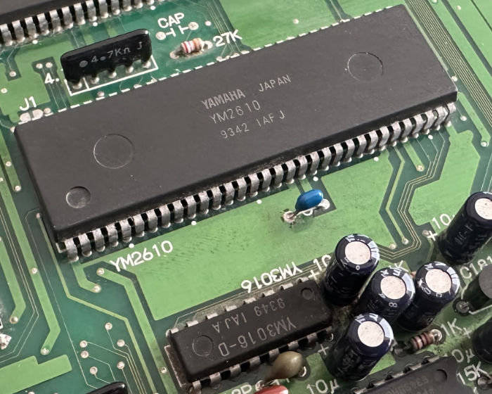 Vintage Yamaha YM2610 sound synthesizer and support circuitry on arcade PCB.